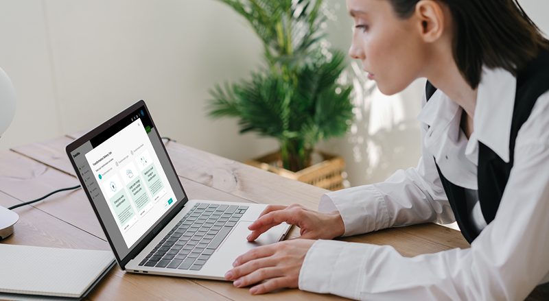 mockuuups-macbook-air-mockup-used-by-a-corporately-dressed-lady